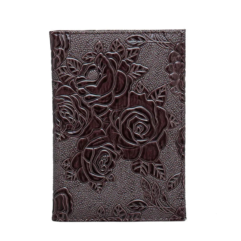 Protège-passeport marron avec motif floral en relief