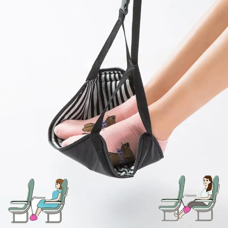 Repose-pieds de voyage attaché à une table d'avion