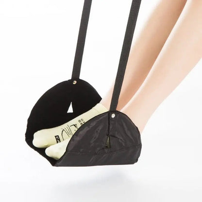 Repose-pieds noir avec sangle ajustée pour confort optimal