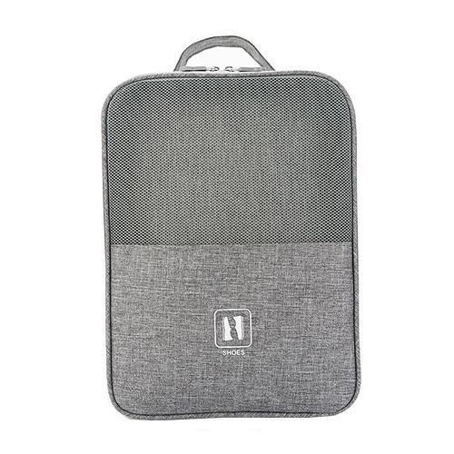 Sac à chaussures gris avec fermeture éclair visible