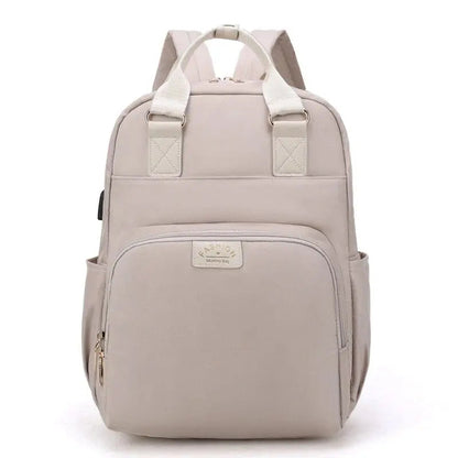 Modèle beige du sac à dos avec fermeture éclair visible