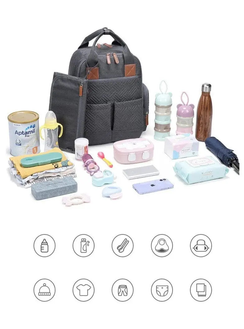 Sac à dos à langer avec poches multiples et tapis intégré
