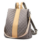 Sac à dos matelassé en gris et beige, élégant et sûr