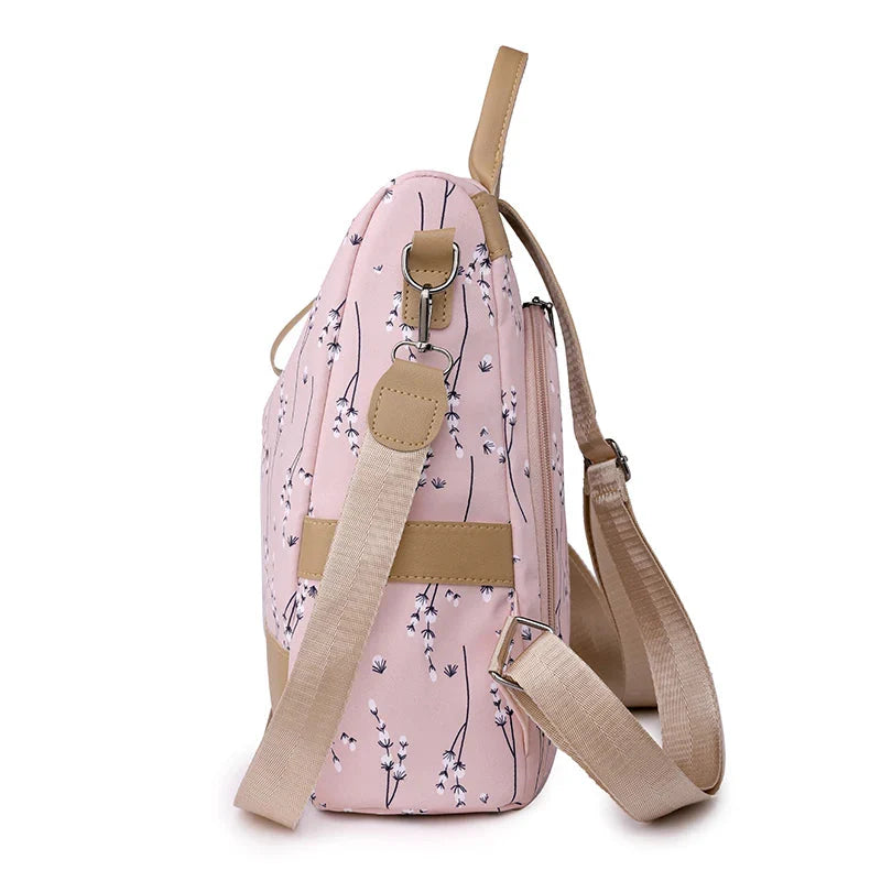 Sac à dos fleuri porté sur le dos, ouverture cachée