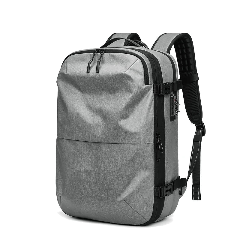 Sac à dos gris avec compartiments multiples visibles