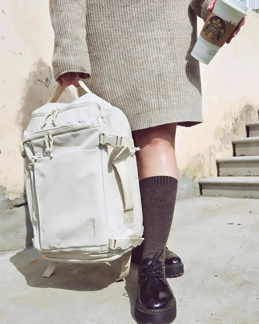 Sac à dos cabine extensible avec poches zippées visibles