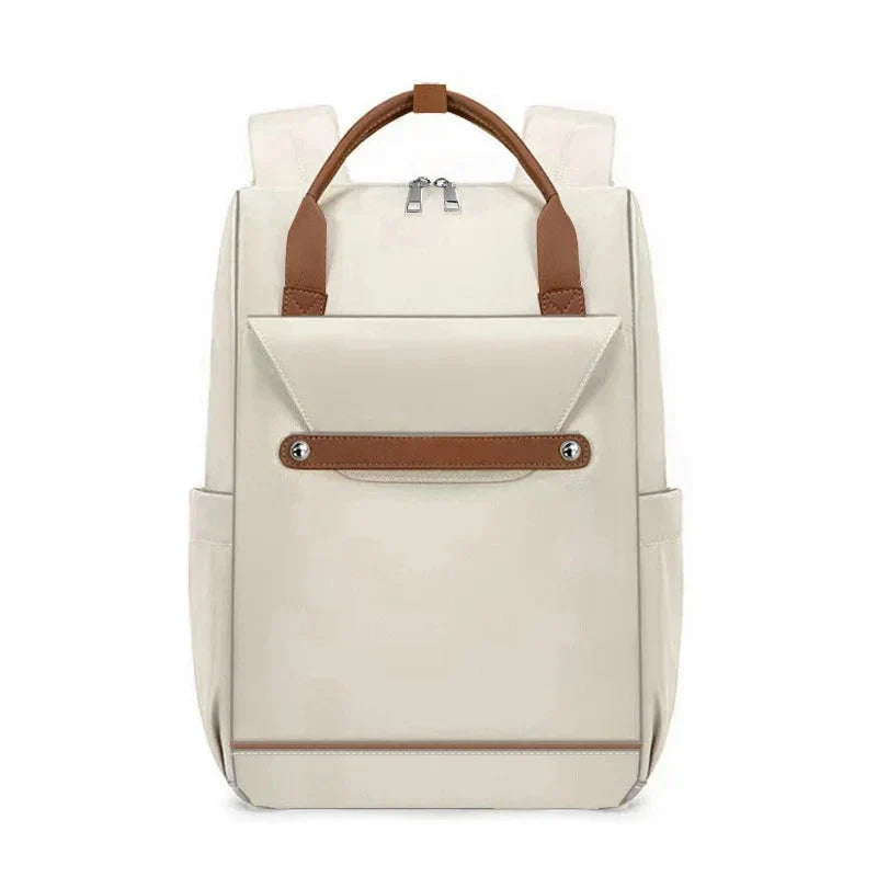 Sac à dos beige avec compartiments pratiques pour accessoires
