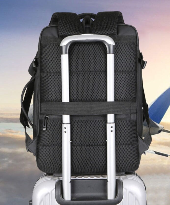 Vue arrière du sac à dos avec sangle pour valise et poche secrète
