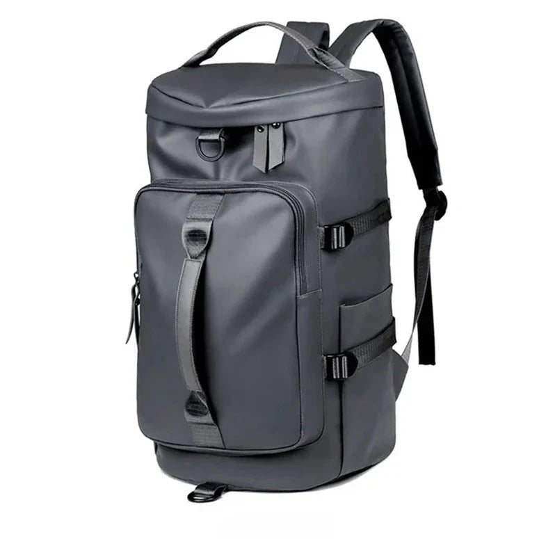 Sac à dos gris avec fermeture éclair visible sur le dessus