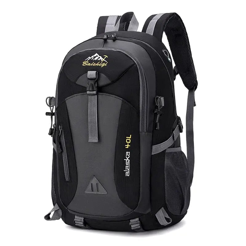 Sac à dos de voyage 40L en noir, vue de profil
