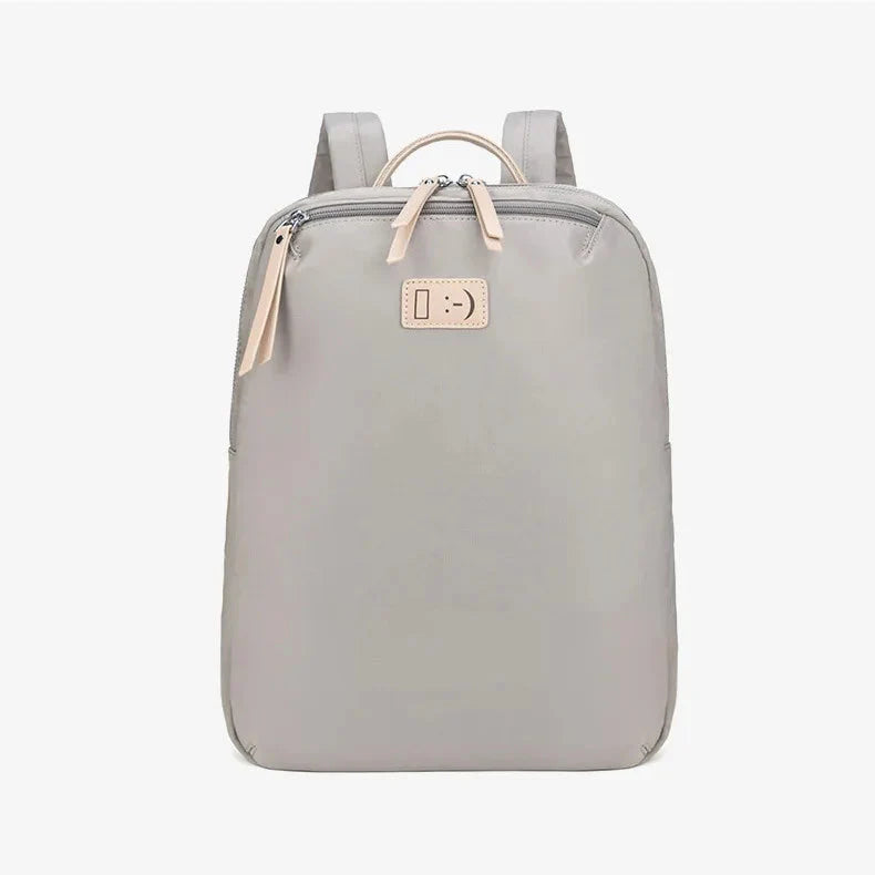 Sac à dos femme gris, design moderne et fonctionnel