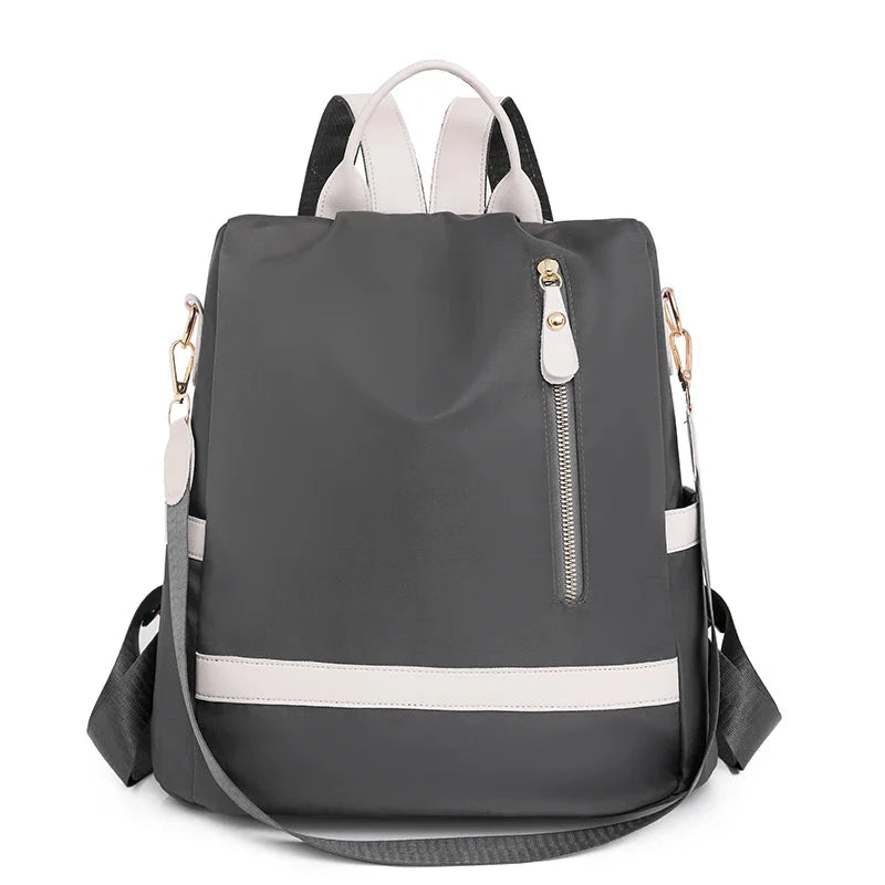Version grise du sac à dos, élégante et moderne