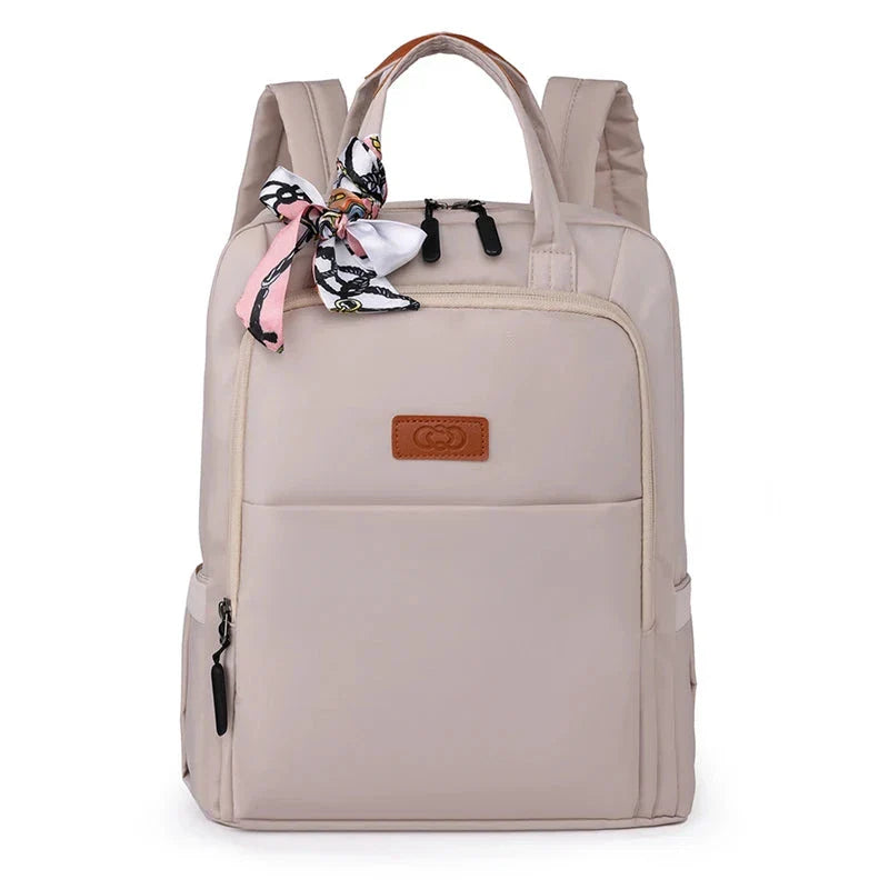 Sac à dos beige avec finition soignée et légère