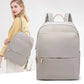 Version grise du sac à dos, parfaite pour un look professionnel