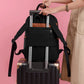 Vue arrière du sac à dos avec sangle pour valise