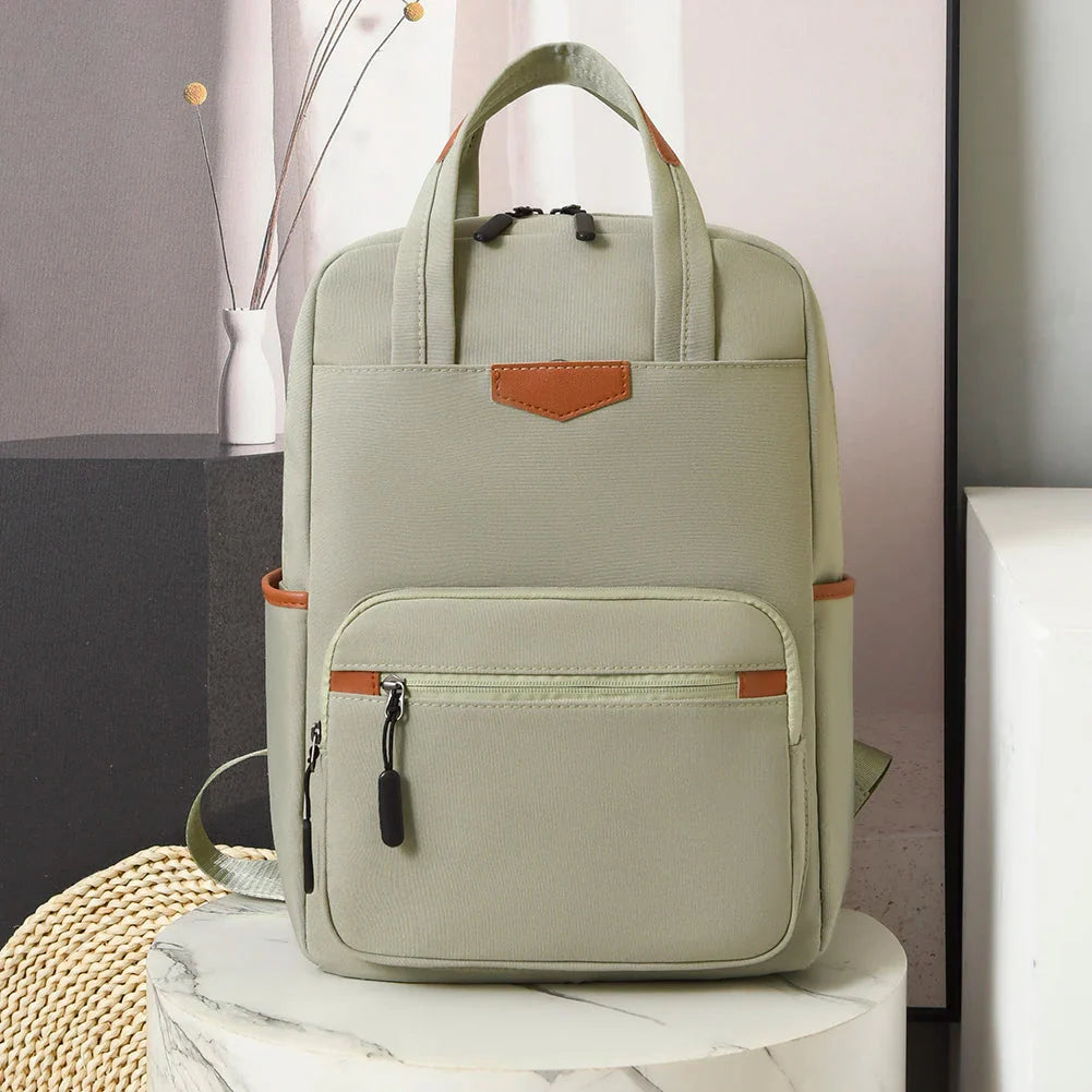 Sac à dos vert avec poches multiples et design moderne