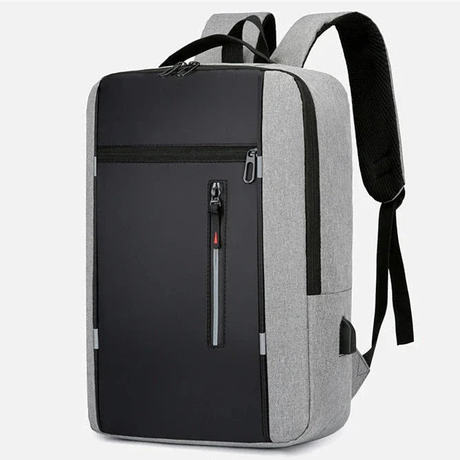 Sac à dos gris avec compartiments pour accessoires électroniques
