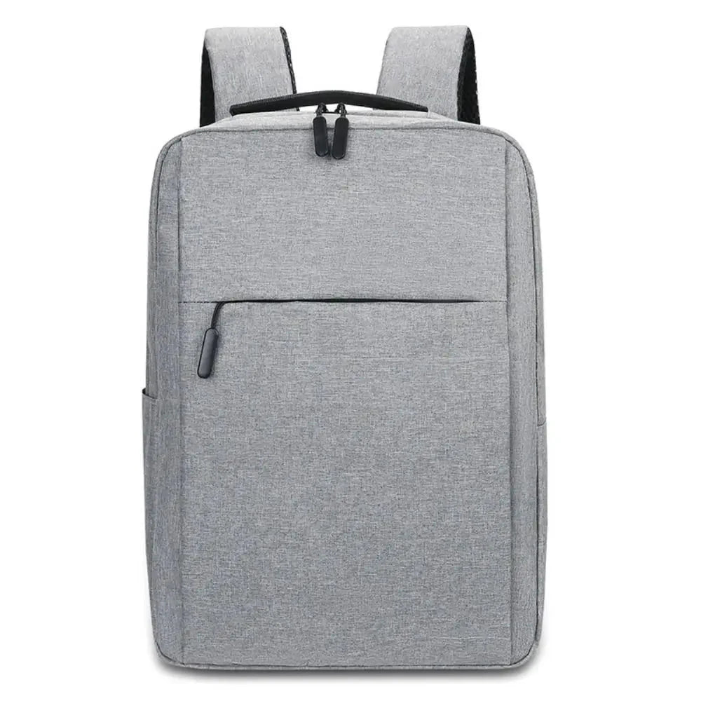 Sac à dos gris avec port USB intégré sur le côté