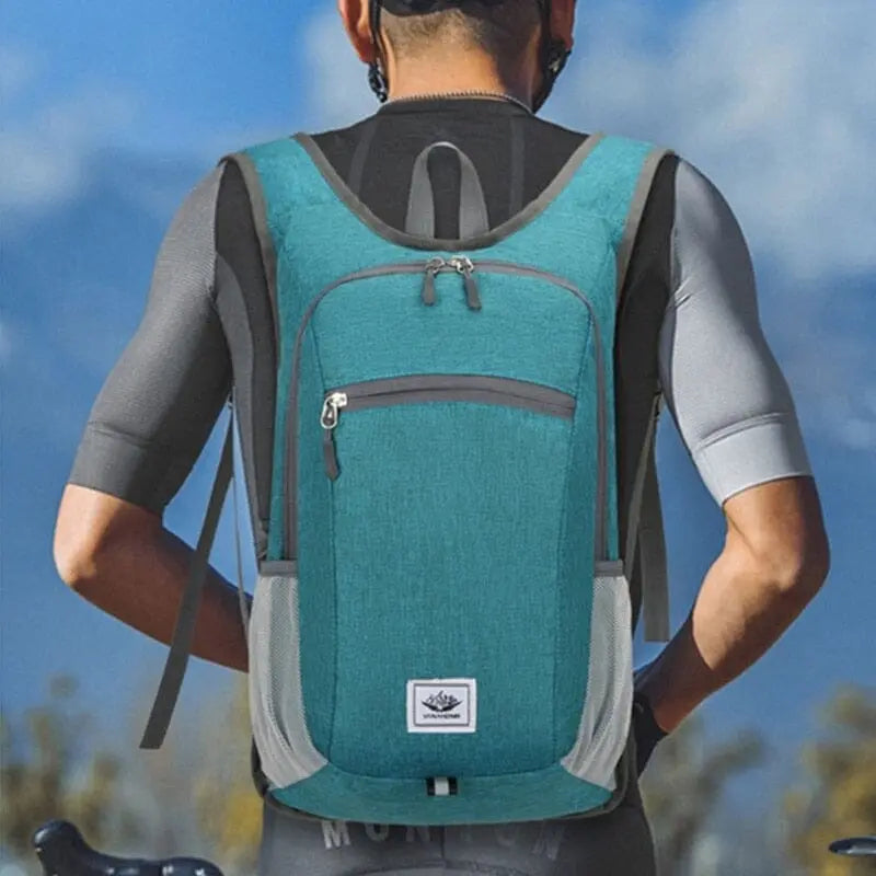 Sac à dos compact, imperméable, avec fermeture éclair visible