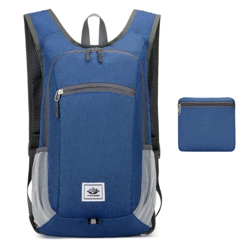 Sac à dos bleu, déplié, avec compartiments multiples