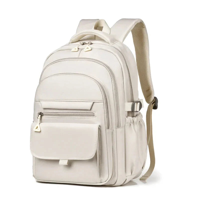 Sac à dos beige élégant avec plusieurs poches de rangement