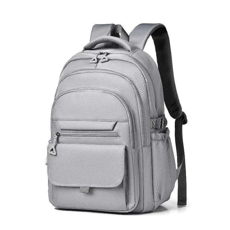 Sac à dos gris avec dos respirant et compartiment pour ordinateur