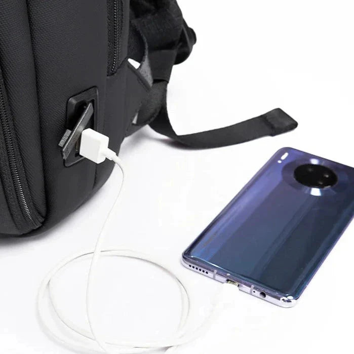 Sac à dos avec sangle pour valise et poche antivol
