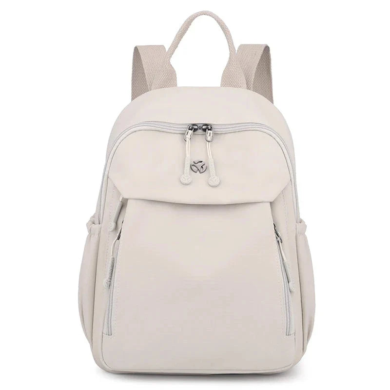 Sac à dos crème, élégant et polyvalent