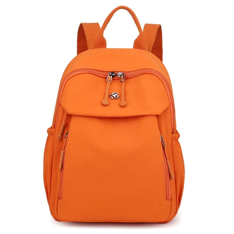 Sac à dos orange vif, idéal pour la ville