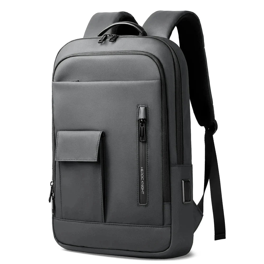 Sac à dos gris avec compartiments organisés