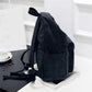 Vue de profil du sac à dos en velours côtelé
