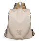 Sac à dos beige avec fermeture antivol au dos