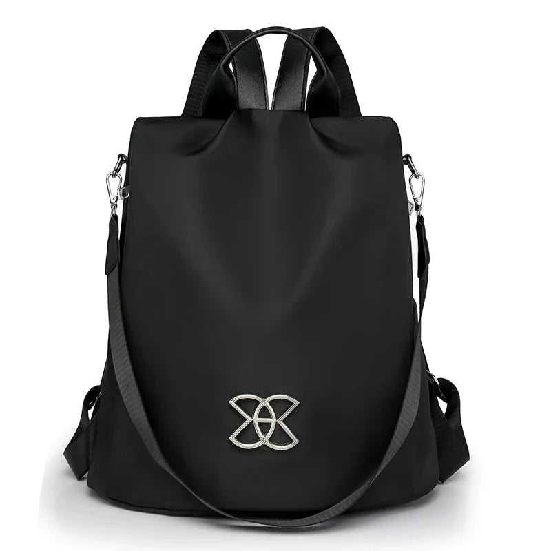 Sac à dos noir, fermeture sécurisée et design urbain