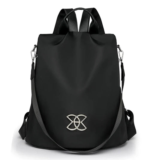 Sac à dos noir, fermeture sécurisée et design urbain