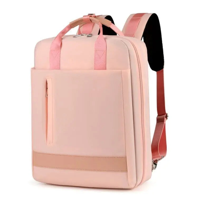 Sac à dos rose, compartiment principal ouvert, intérieur organisé