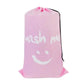 Sac rose en nylon pour vêtements sales en voyage