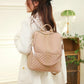 Sac à dos chic, vue latérale montrant les poches