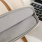 Intérieur du sac à main montrant l'organisation des compartiments