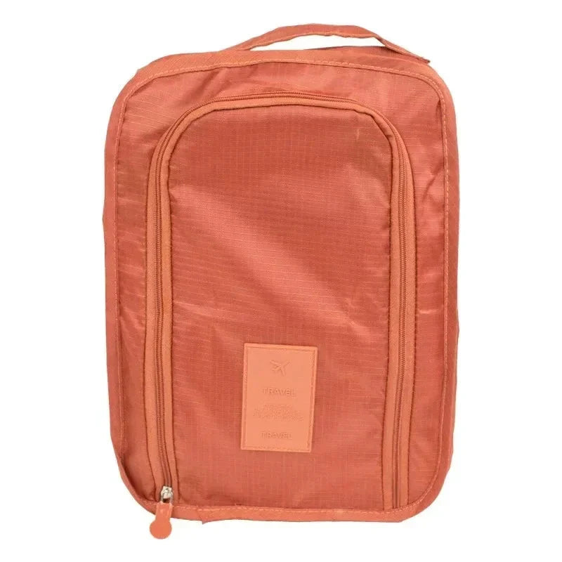 Housse de voyage orange pour chaussures, facile à transporter