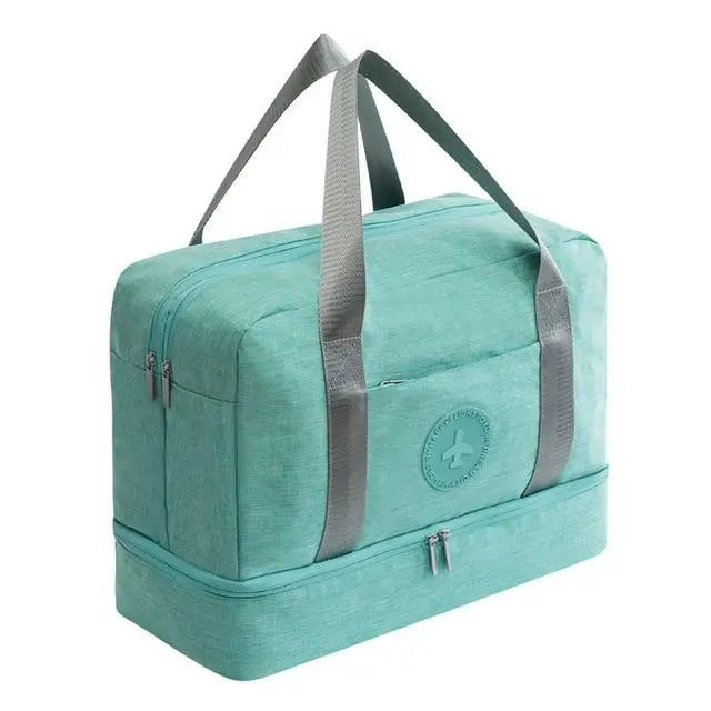 Sac turquoise avec poche frontale et compartiment pour vêtements