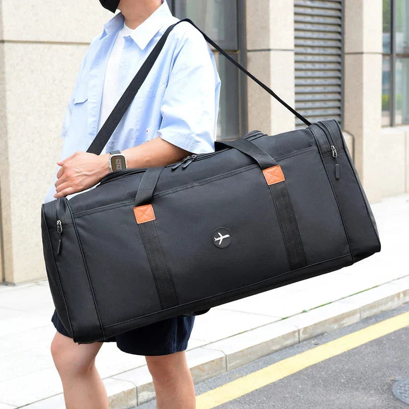 Sac de voyage avec bandoulière ajustable et poignées robustes