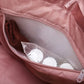 Intérieur du sac doudoune montrant l'organisation pratique