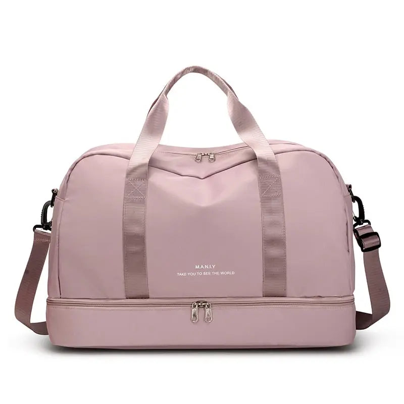Sac de voyage rose avec compartiment chaussures visible