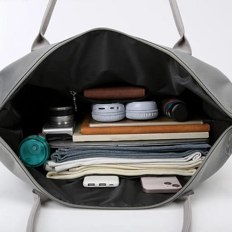 Détail des poignées robustes en PU du sac