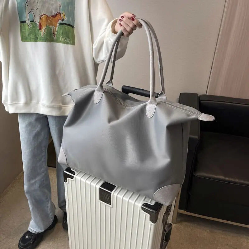 Vue de face du sac de voyage en tissu Oxford