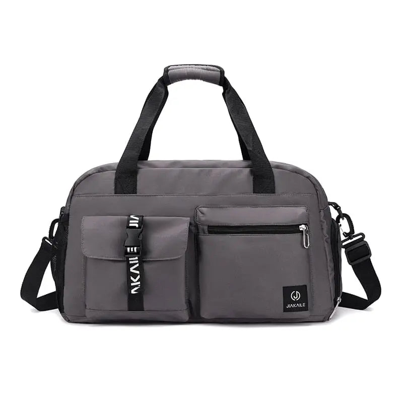 Sac de voyage gris avec compartiment à chaussures visible