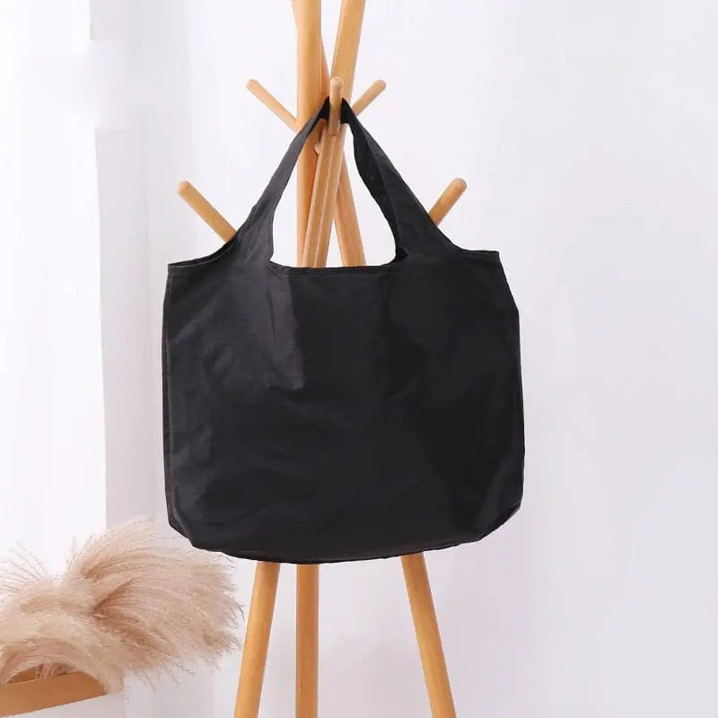 Sac noir pliable en tissu Oxford, vue latérale