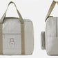 Vue de face du sac avec poche zippée visible