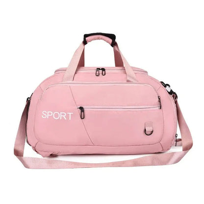 Sac de voyage rose avec multiples poches et bandoulière
