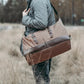 Sac de voyage ouvert avec vêtements rangés à l'intérieur